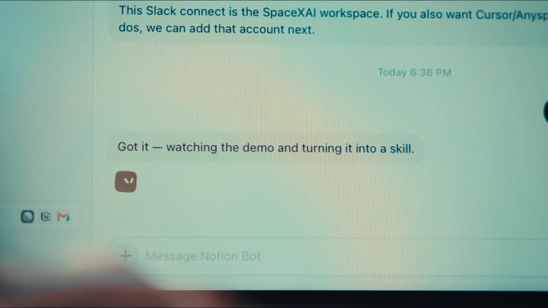 Grok Bot chat thread in a messaging layout with a teammate reply and a message box at the bottom