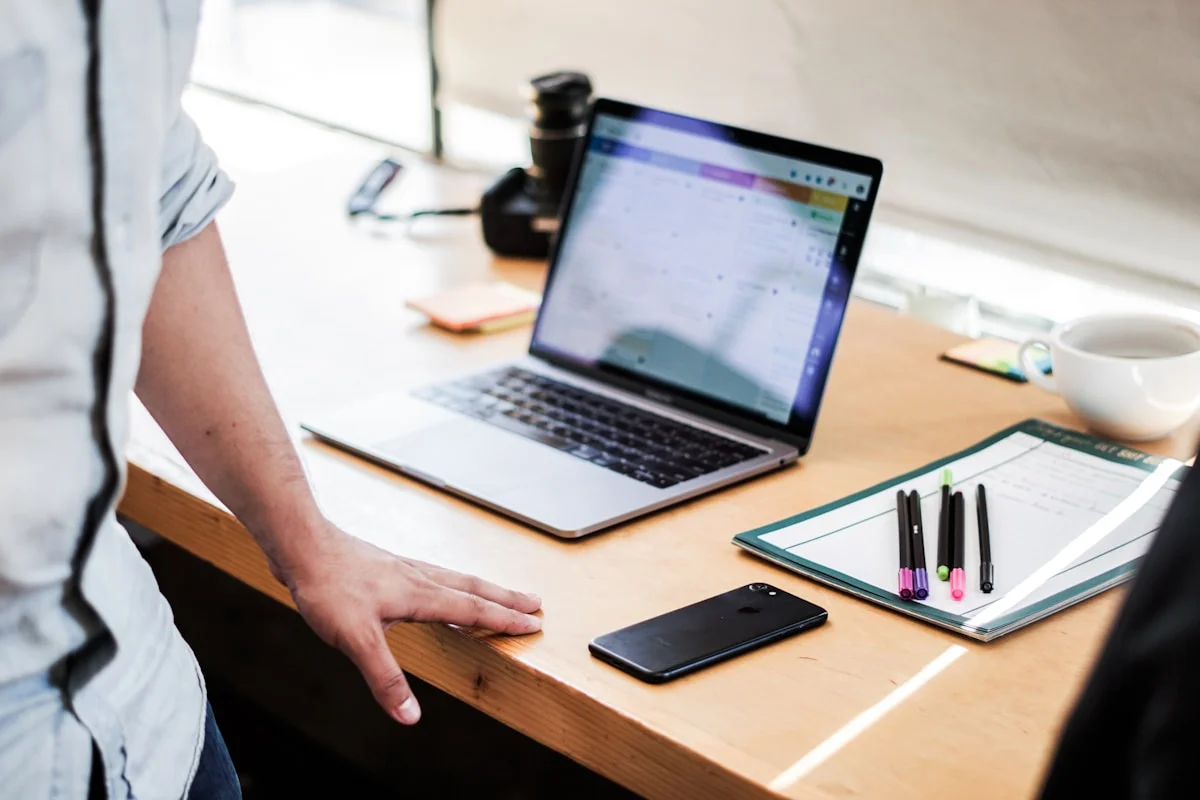 Setting up a Google Ads campaign for photographers on laptop — step-by-step account structure