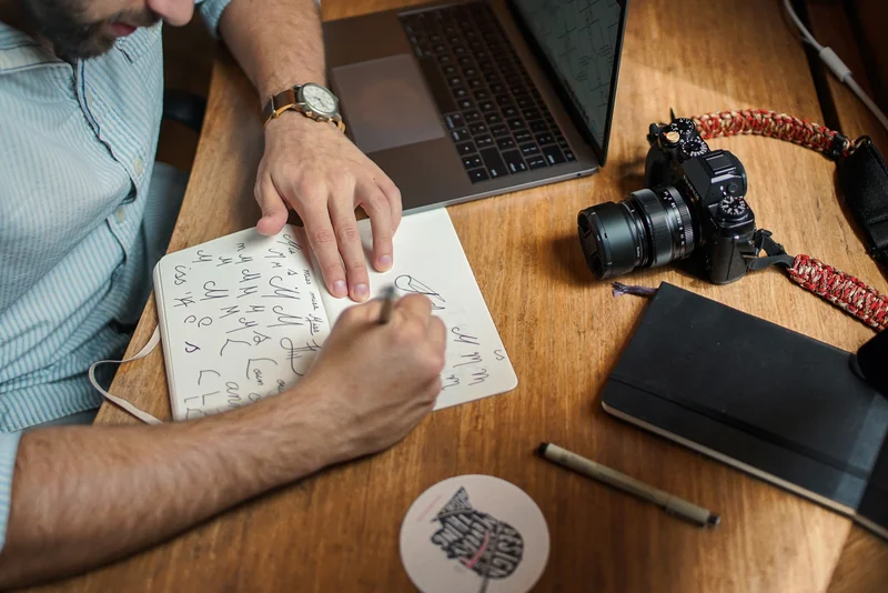 Photographer planning content strategy and blog posts