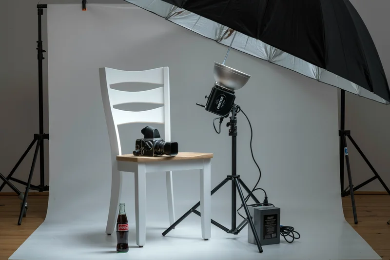 Photographer meeting with client in studio — relationship-based marketing in action