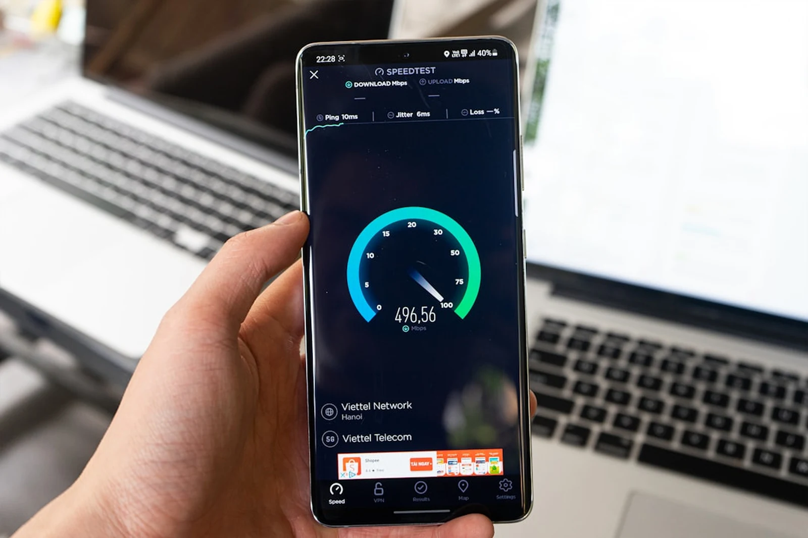 Mobile phone loading a photography website — site speed and Core Web Vitals testing for photographers
