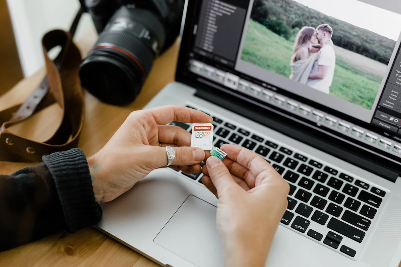 Photographer editing and optimizing images on computer — image SEO workflow for photography websites