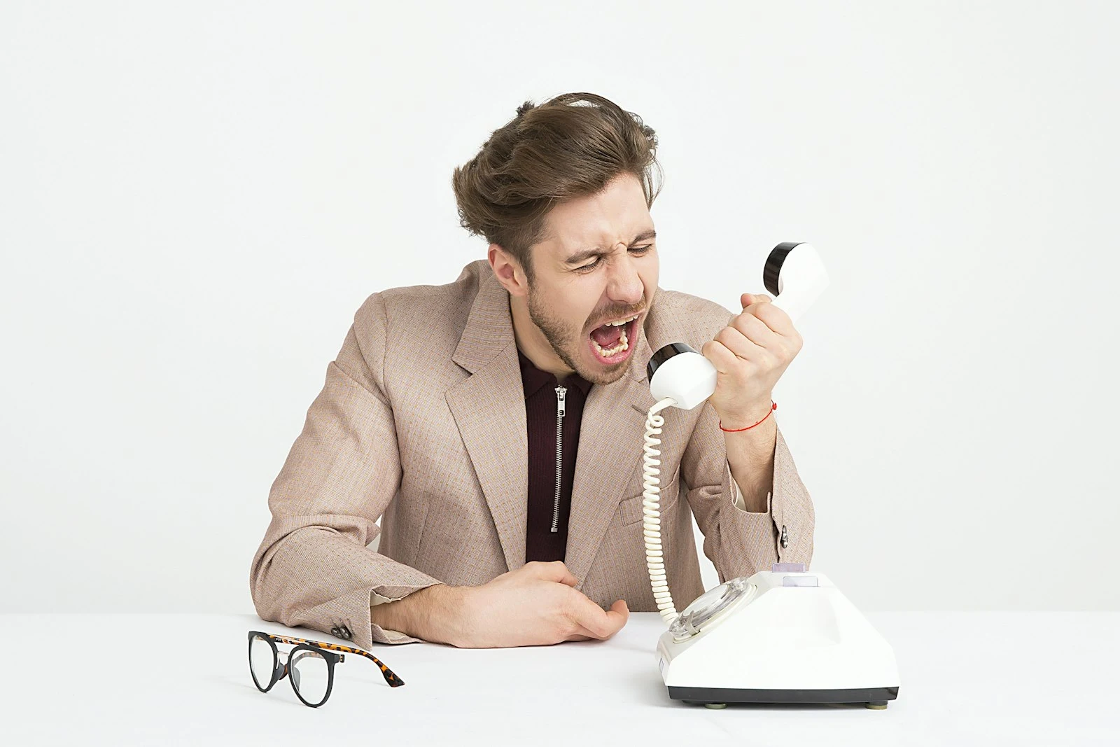Frustrated person waiting for slow website to load on mobile phone