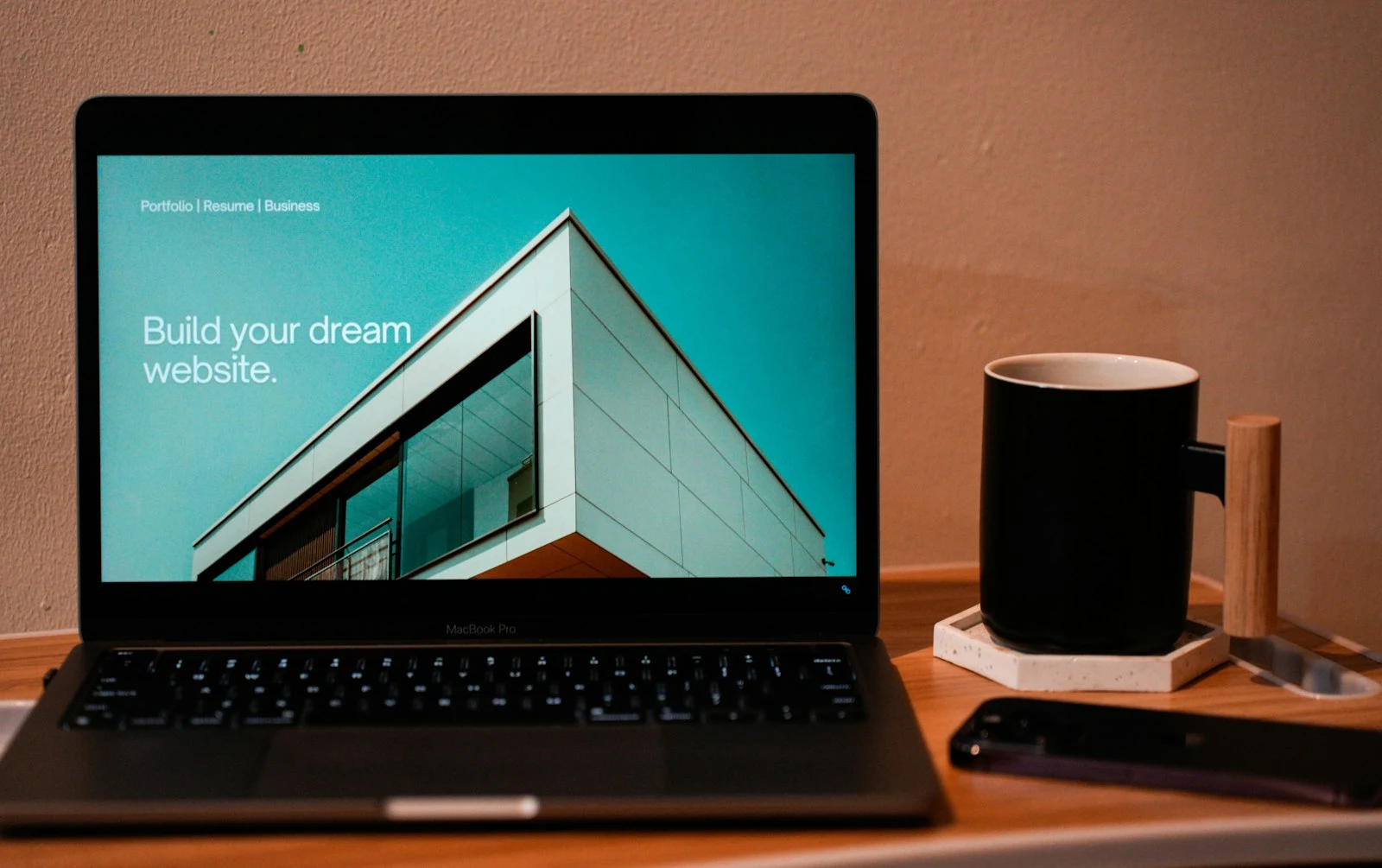 Clean minimal website on laptop — what a high-converting photography website looks like